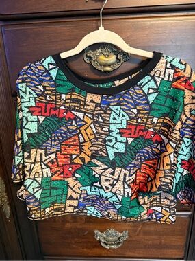 Zumba Fitness Multicolor Geometric Crop Tee - Green, Blue, Red, Tan